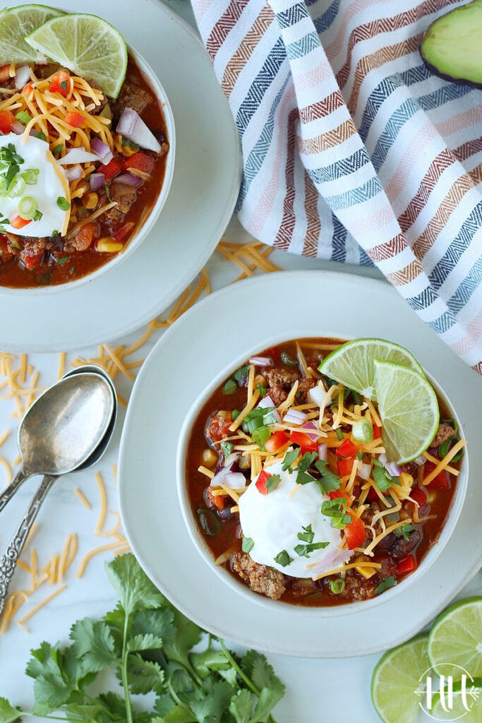 Healthy and easy ground beef Mexican stew in rustic ceramic bowls.