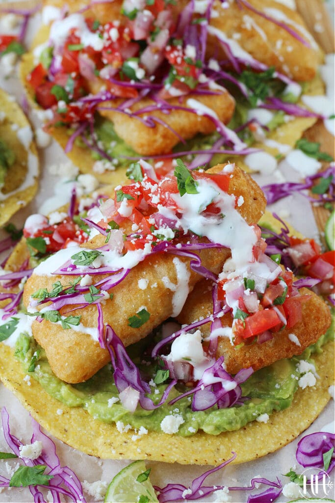 Learn now to make crispy battered fish in the air fryer and use in tostadas with guacamole.