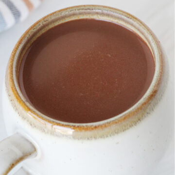 Up close photo of bone broth hot cocoa in a mug.