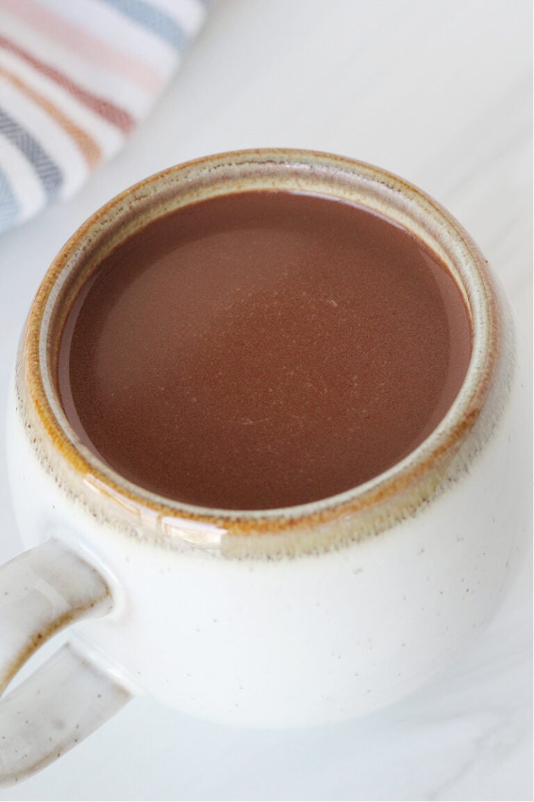 Up close photo of bone broth hot cocoa in a mug.