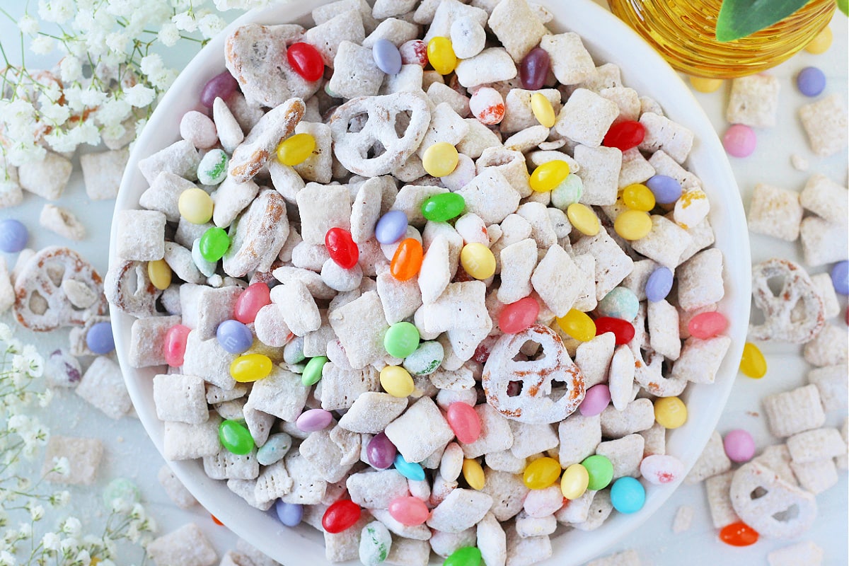 Overhead photo of Easter Bunny Bait in a white bowl with jelly beans and M&Ms.