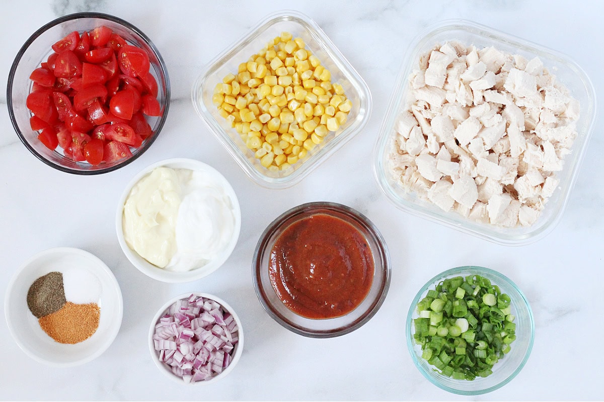 Overhead photo of ingredients in bowls for creamy bbq chicken salad.