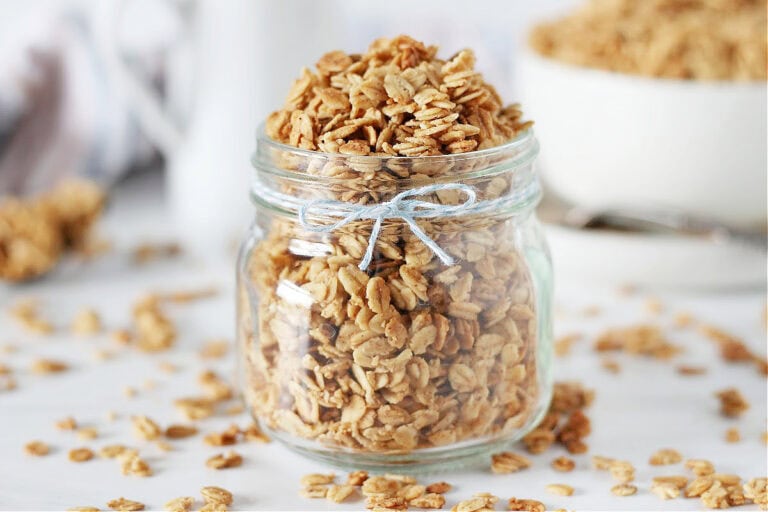 An up close photo of a jar of homemade gluten free granola.