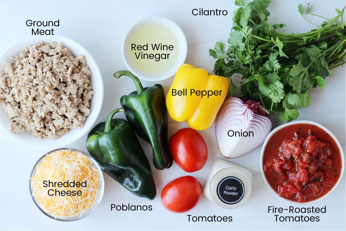 Ingredients for easy southwest stuffed poblano peppers on a white countertop.