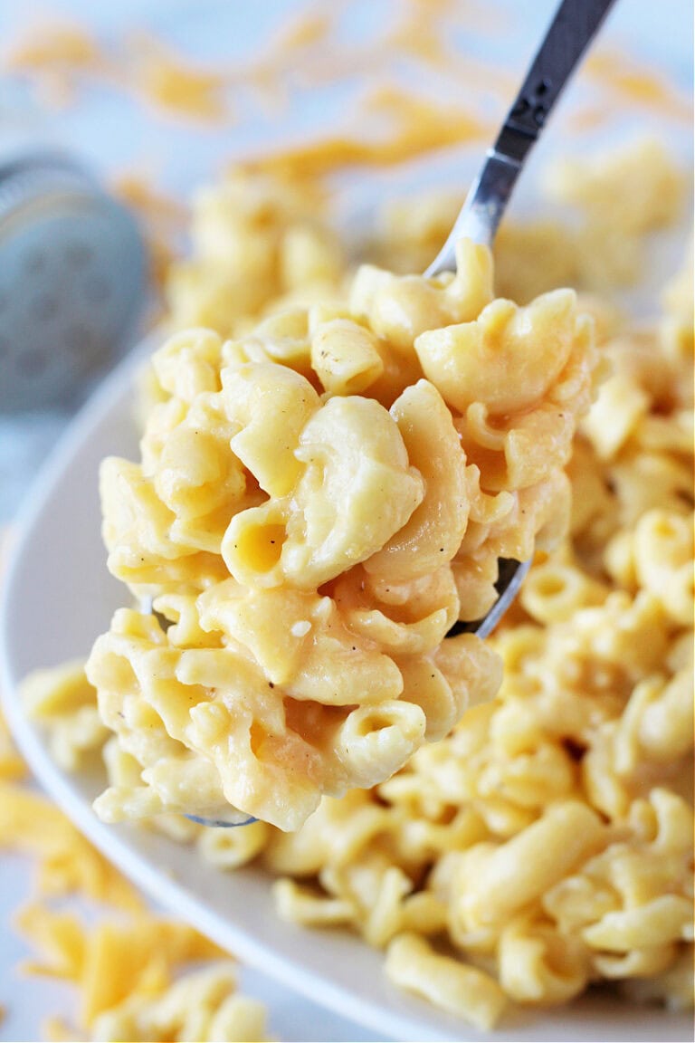 High protein mac and cheese on a metal serving spoon.