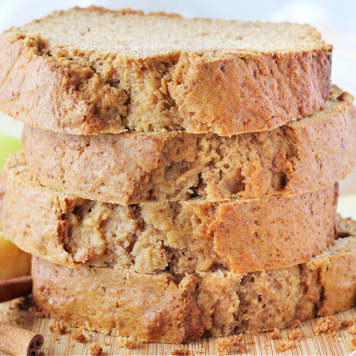 Up close photo of four stacked slices of low sugar apple butter bread.