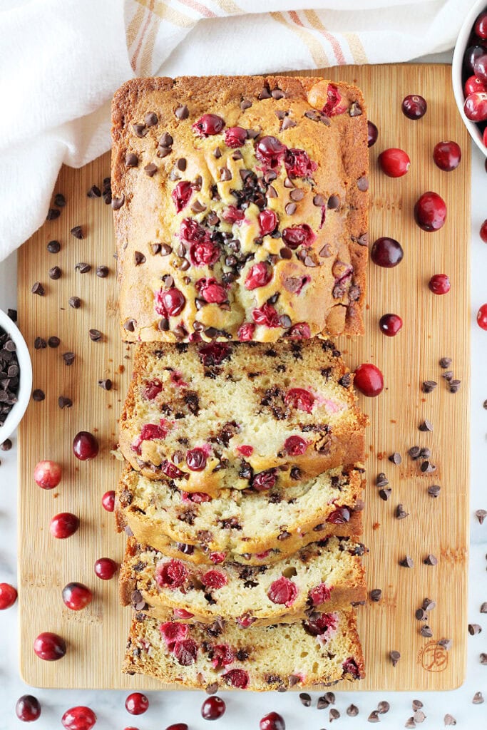 Overhead photo of a loaf of holiday bread with mini chocolate chips and cranberries.