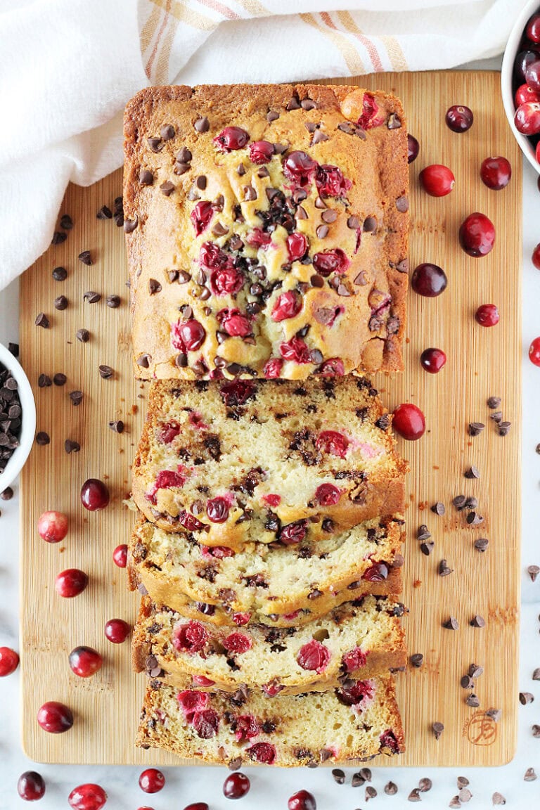 Overhead photo of a loaf of holiday bread with mini chocolate chips and cranberries.