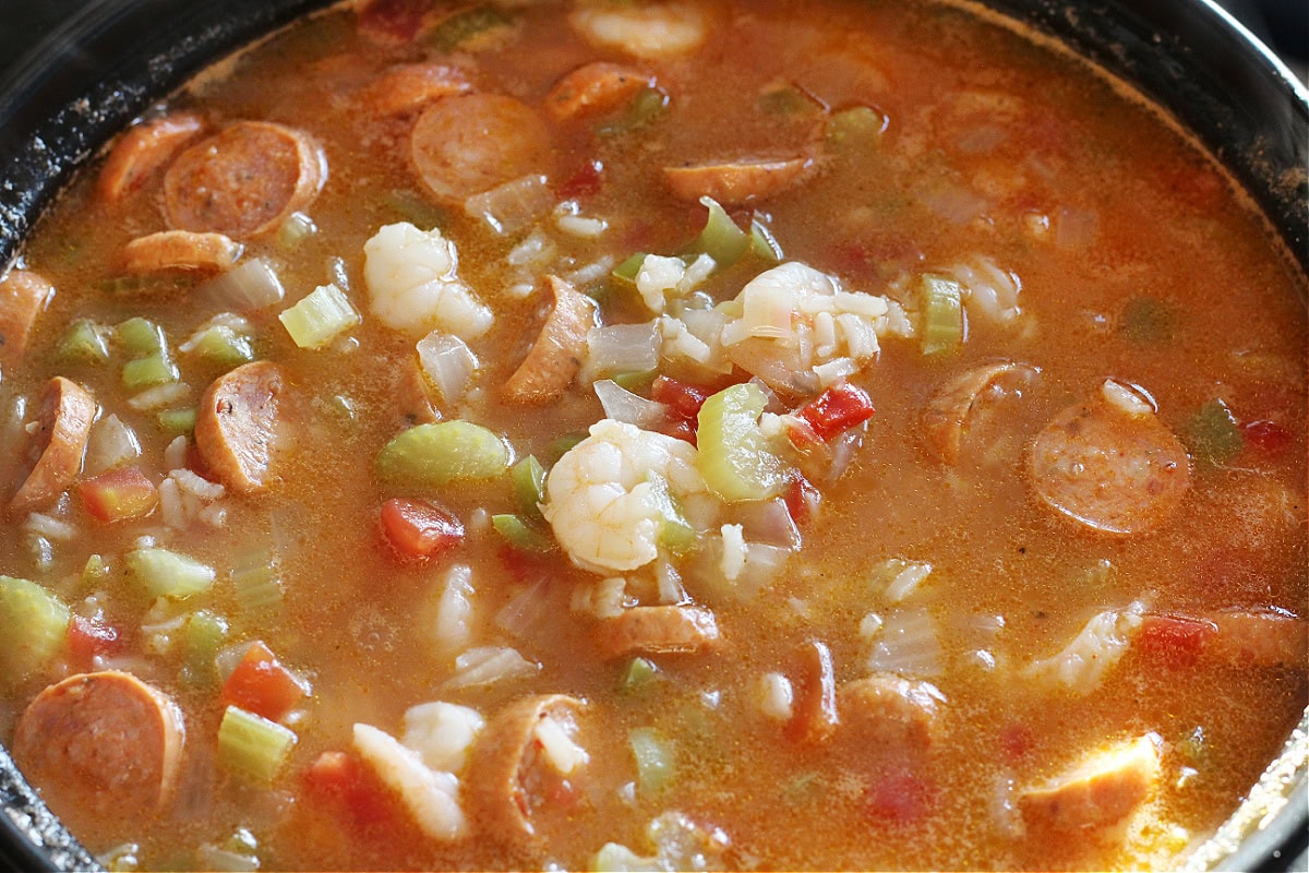 Gumbo Jambalaya with shrimp and chicken andouille sausage in a large soup pot.