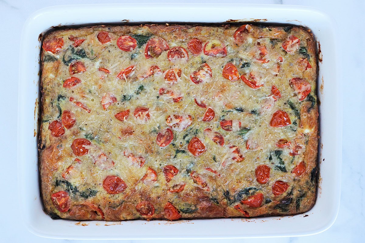 Overhead photo of an egg casserole fresh from the oven in a 9x13 pan.