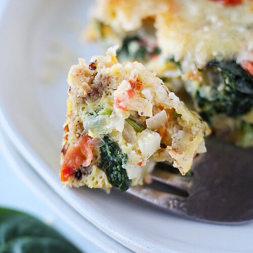 Up close photo of turkey sausage breakfast casserole on a fork.