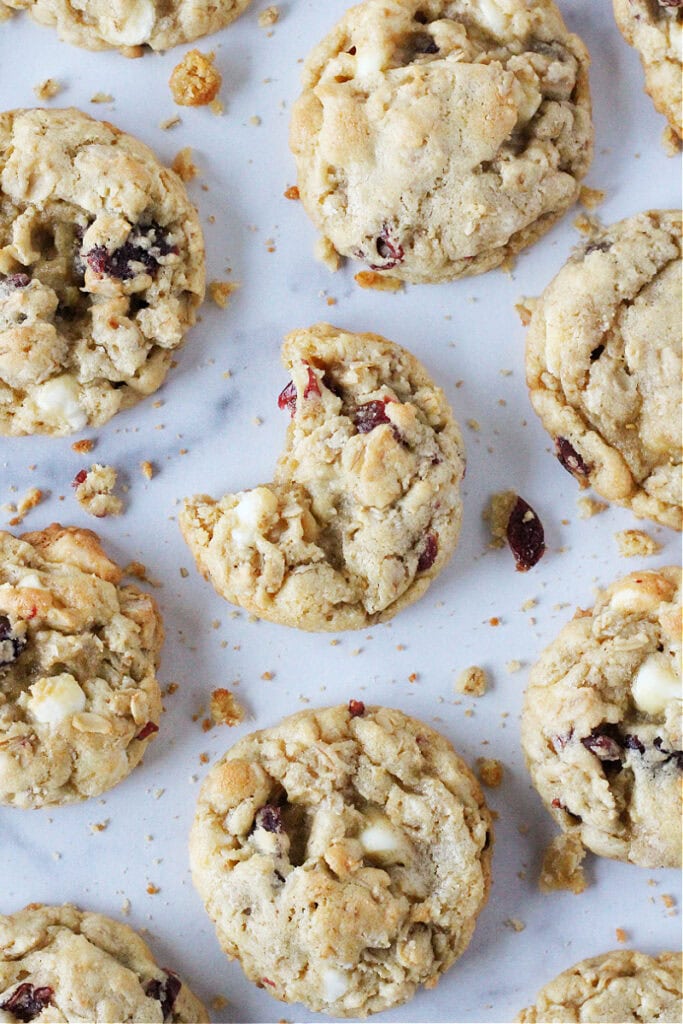 Overhead photo of cookies with a bite taken out of the middle one.