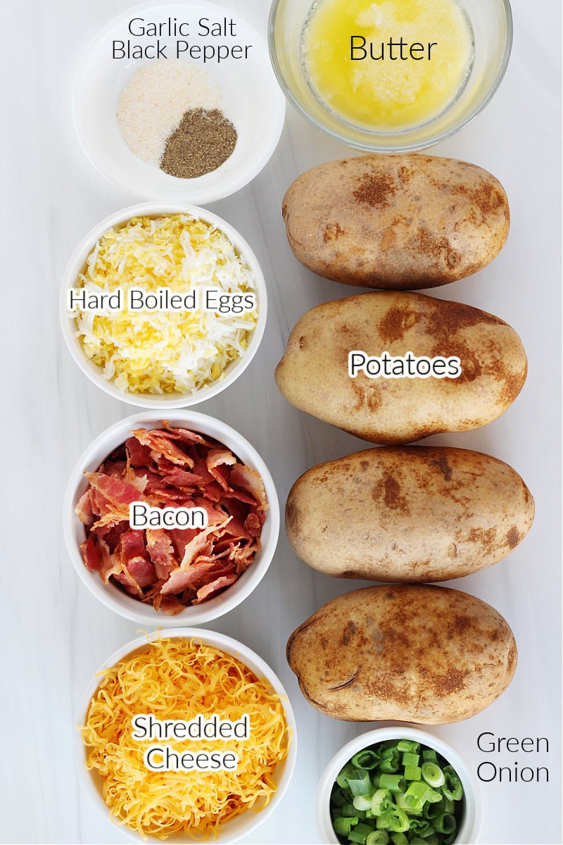 Labeled ingredients on a white marble countertop for air fryer potates.