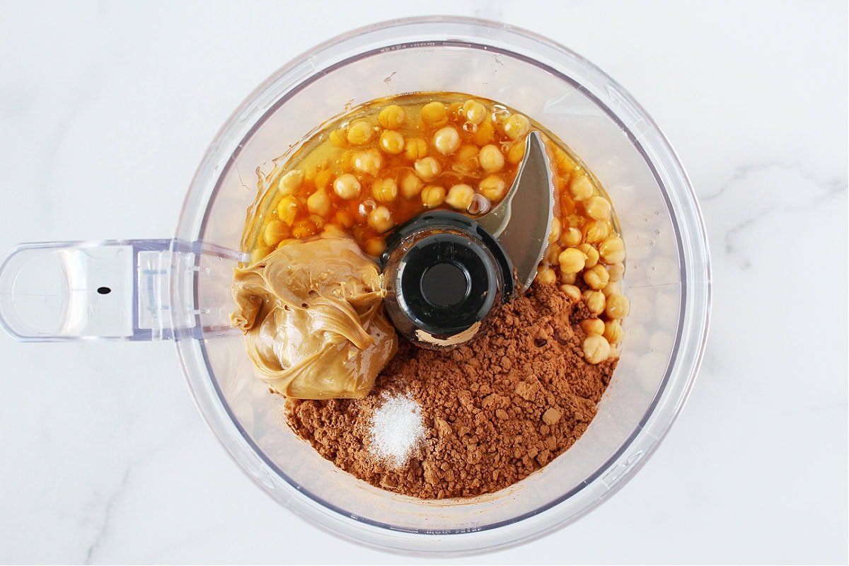 Chickpeas, honey, peanut butter, cocoa powder and salt in a food processor.