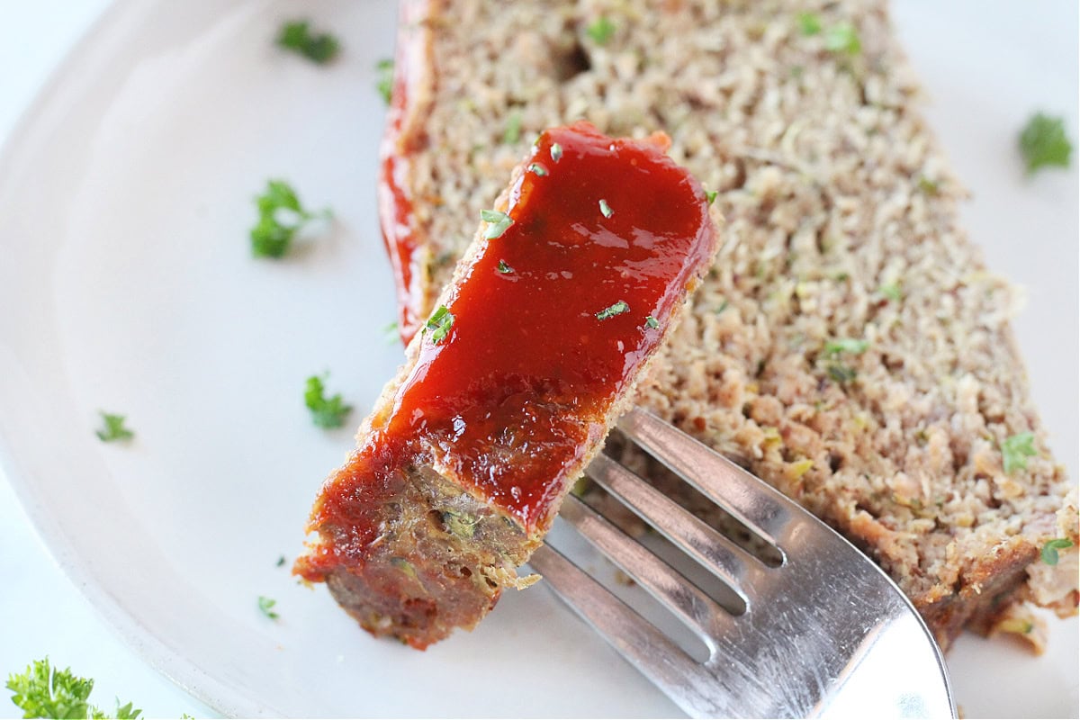 Piece of whole foods meatloaf on a fork.