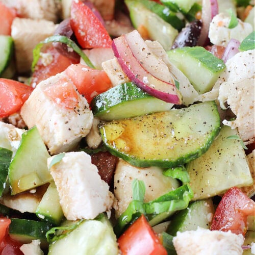 Balsamic vinegar and oil over fresh veggies and diced chicken.