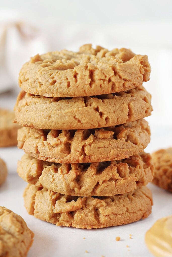 Five peanut butter cookies stacked on top of each other.