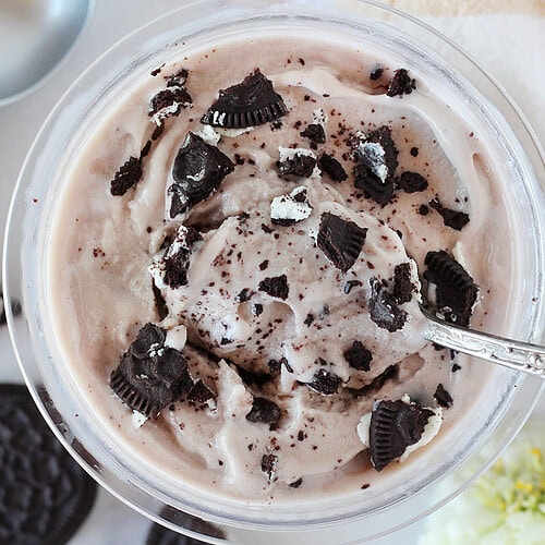 Crushed Oreos on top of Ninja Creami cookies and cream ice cream.