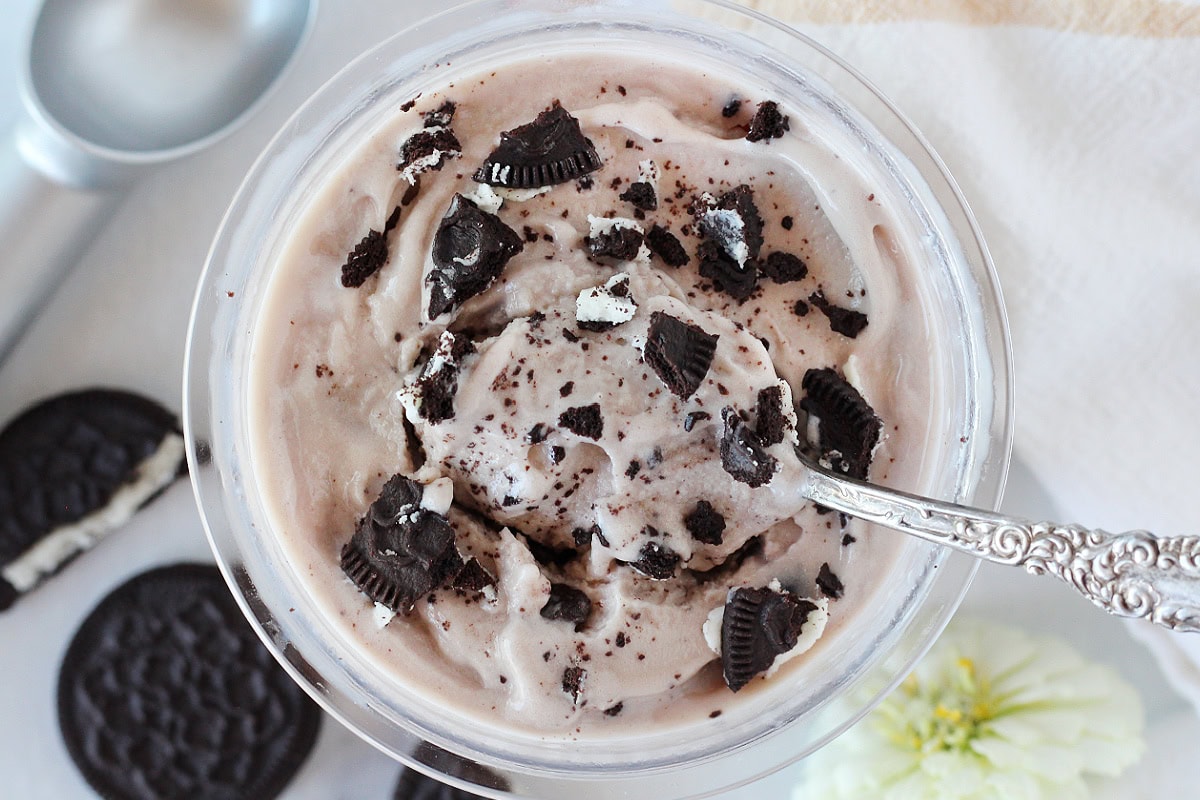 Crushed Oreos on top of Ninja Creami cookies and cream ice cream.