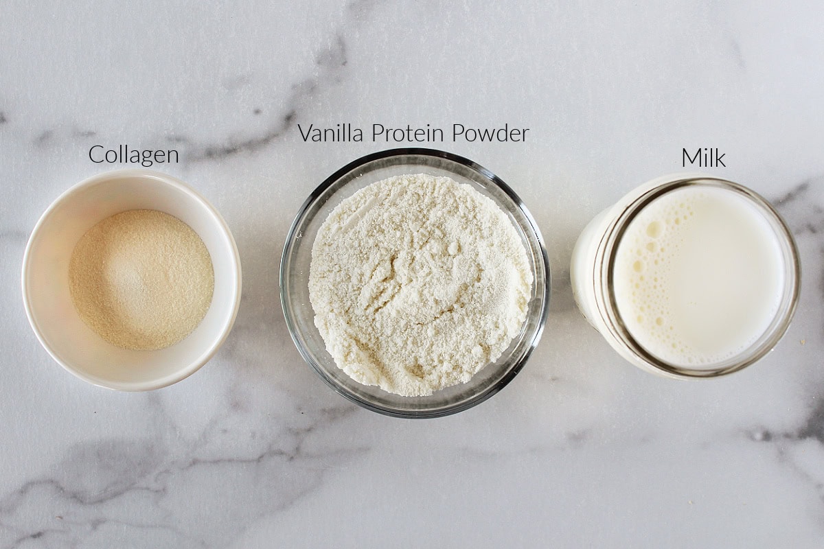 Collagen, protein powder, and milk in jars for ice cream on a white marble countertop.