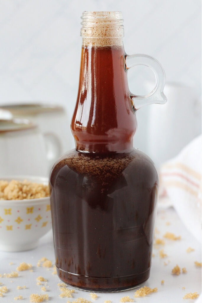 Cinnamon brown sugar coffee syrup in a glass bottle.