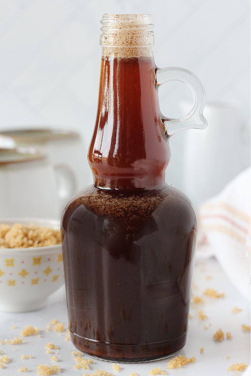 Cinnamon brown sugar coffee syrup in a glass bottle.