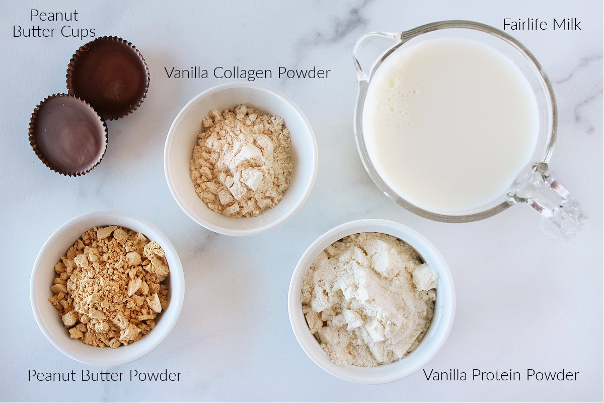 Labeled ingredients for peanut butter cup Ninja Creami ice cream on a white marble countertop.