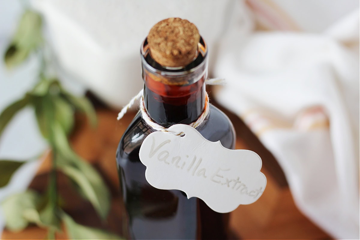 A handwritten label on a bottle of homemade vanilla extract.