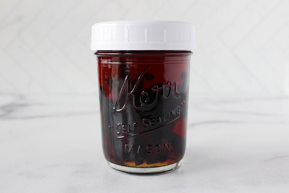 Vanilla extract that has steeped for 6 months in a mason jar with lid.