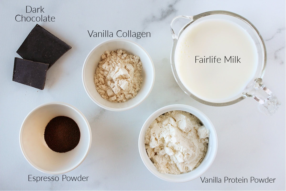 Labeled ingredients for Ninja Creami Espresso Ice Cream on a white marble countertop.