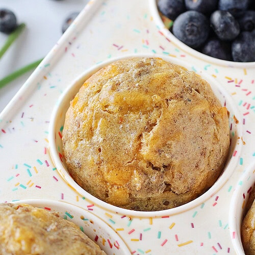 Cheesy sausage pancake mix muffins in a confetti themed silicone pan.