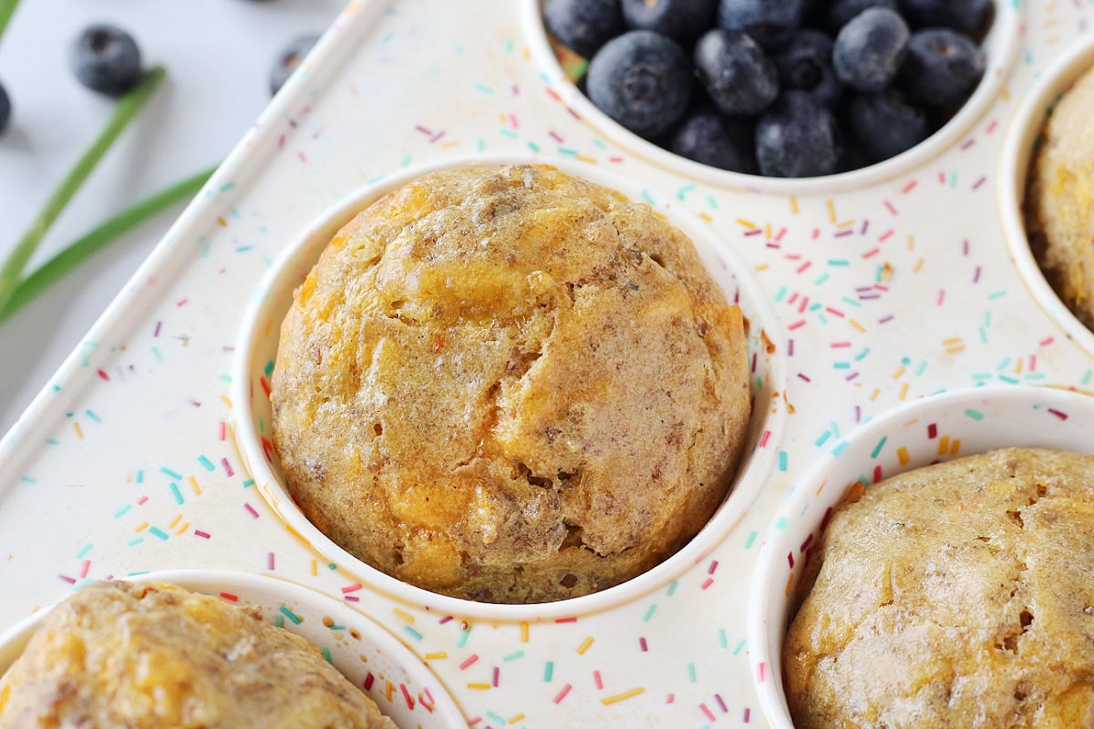 Cheesy sausage pancake mix muffins in a confetti themed silicone pan.
